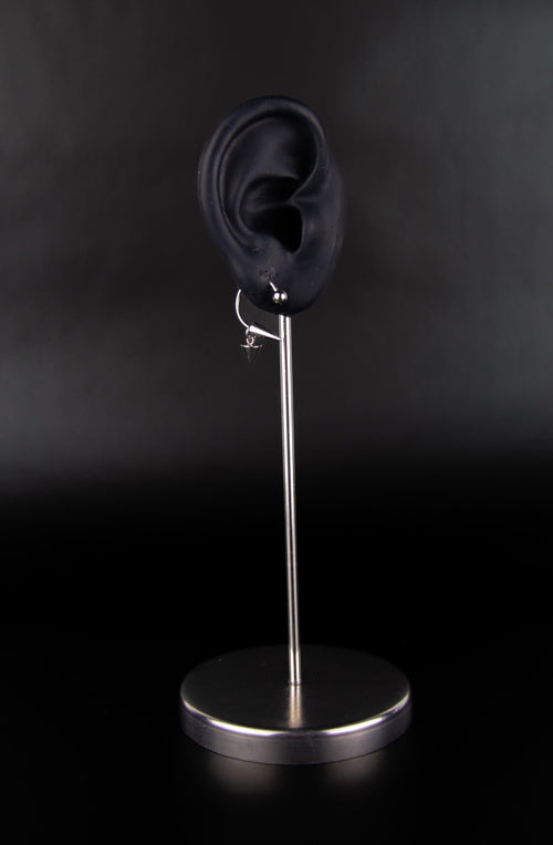 Paire de boucle d’oreille avec deux pics et un fermoir boule à visser 
