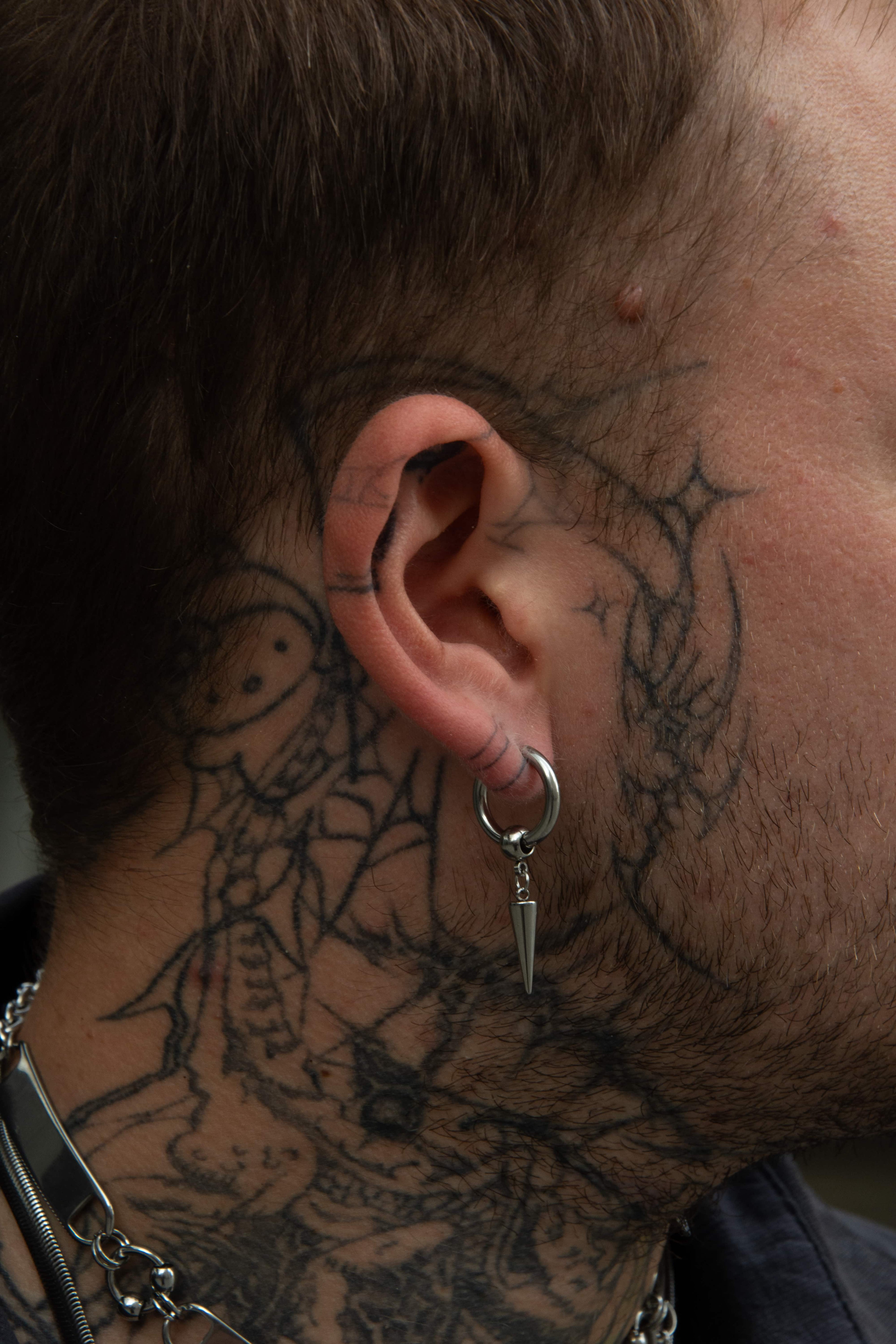 Paire de boucle d’oreille alt et mixte en acier inoxydable.