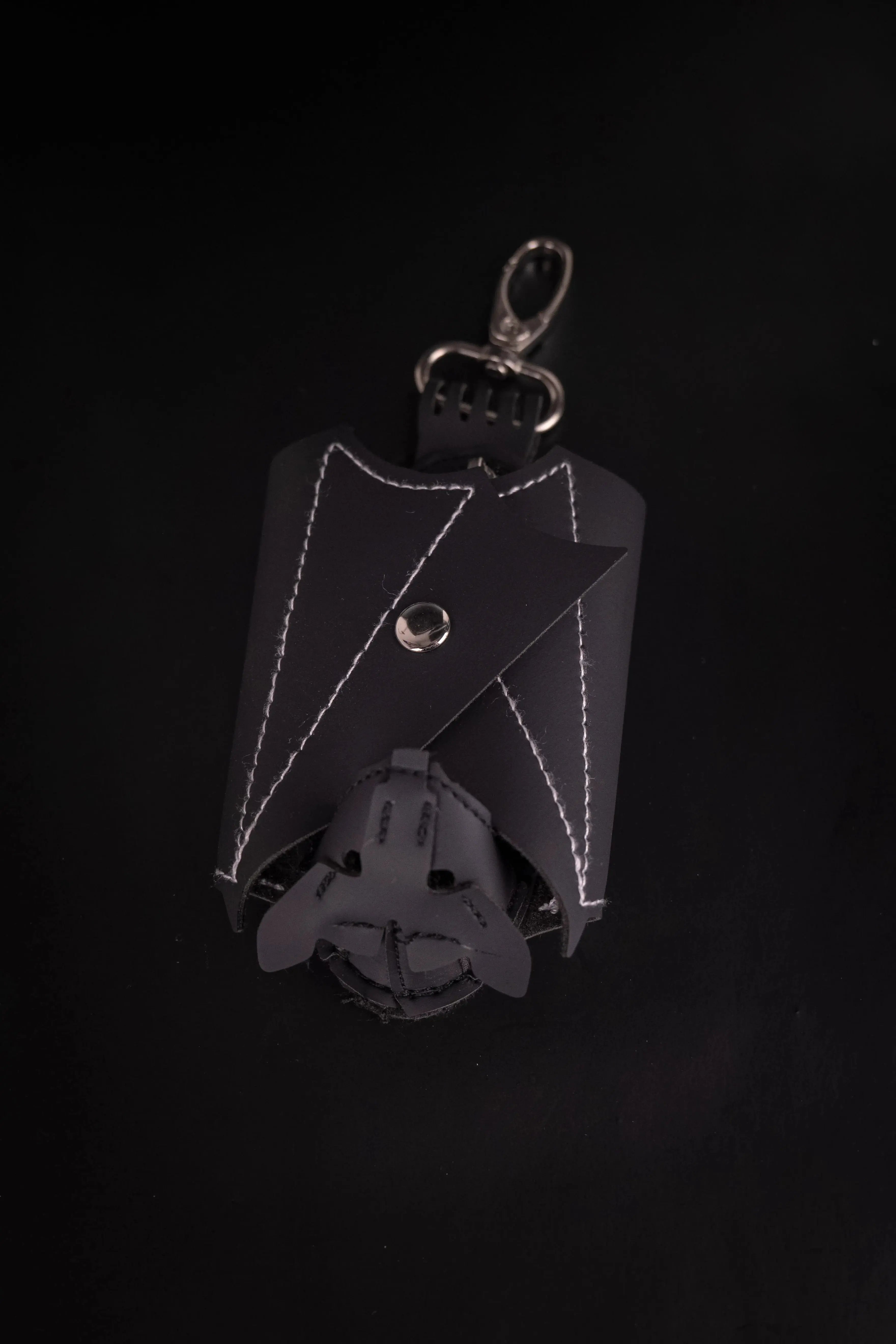 Porte monnaie chauve souri à faire pendre de partout pour un style complet.